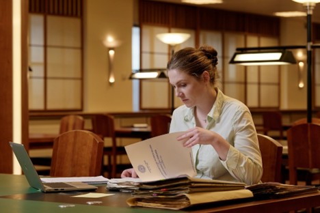 Photo of woman doing research